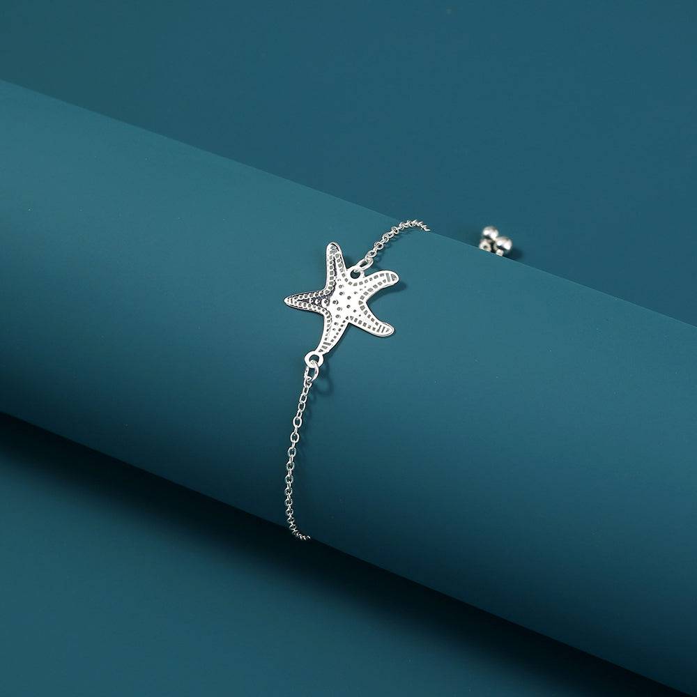 Silver starfish, glow-in-the-dark shrink bracelet