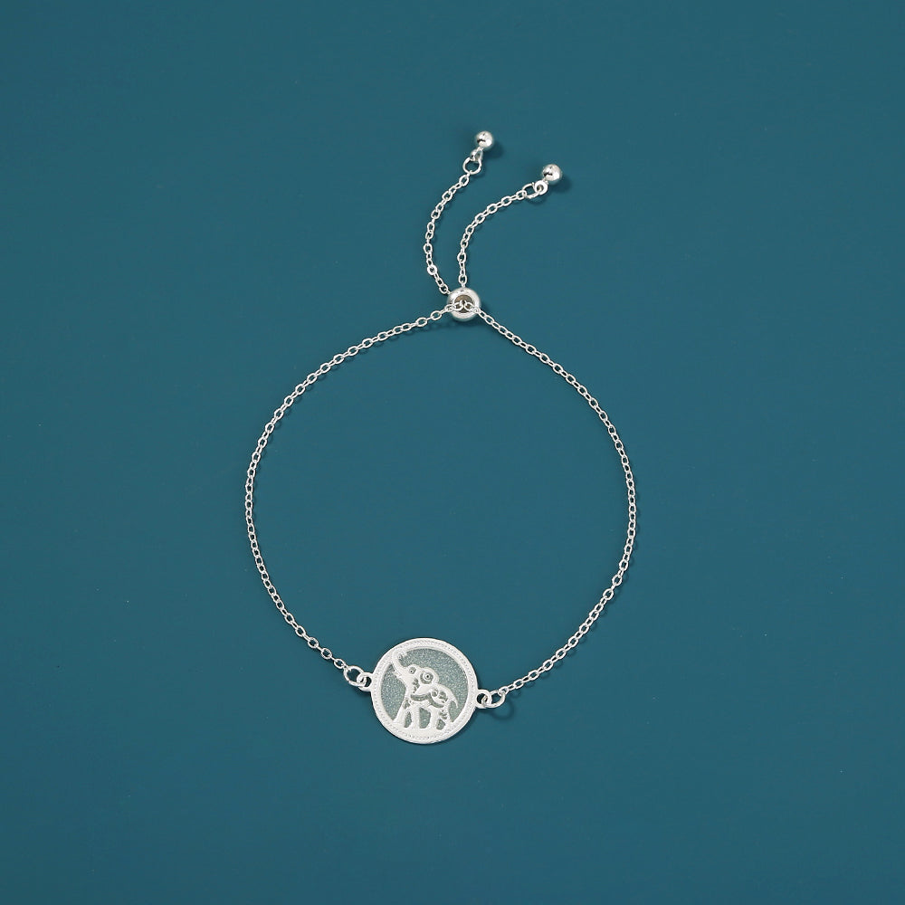 Silver Round copper disc luminous elephant bracelet